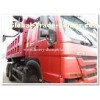 HOWO Over Vehicle heavy duty dump truck with payload Ventral lifting and 3 seats with sleeper  A / C