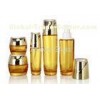 Color-Coating Yellow Cosmetic Glass Bottles ,  Empty Lotion Bottles  With Plastic Pump Cap
