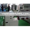 Plastic tube extruder