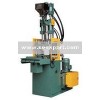 Single slide tale injection molding machine