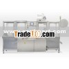 Thermoforming machine for coffee capsules