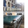 Conveyor with plastic bags sealing system