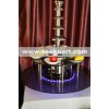 Rotatable illuminated base for chocolate fountain