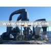 High pressure suspension grinding mill
