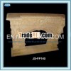 Yellow stone fireplace mantel with lion carving