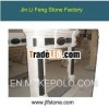 white and black marble stone fireplace surround