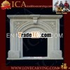 carved sandstone fireplace