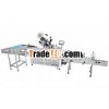 Vertical Feeding and Horizontal bottle inserting tray labeling machine