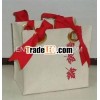 HESSIAN PLANTER WITH RED LEAF PATTERN WITH RIBBON