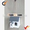 Decorative hanging wooden birdhouse