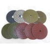 Diamond polishing pad for wet use