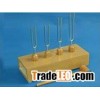 four tuning forks on resonance box